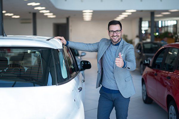 Happy Car Buyer — Chicago, IL — Illinois Insurance Center Inc