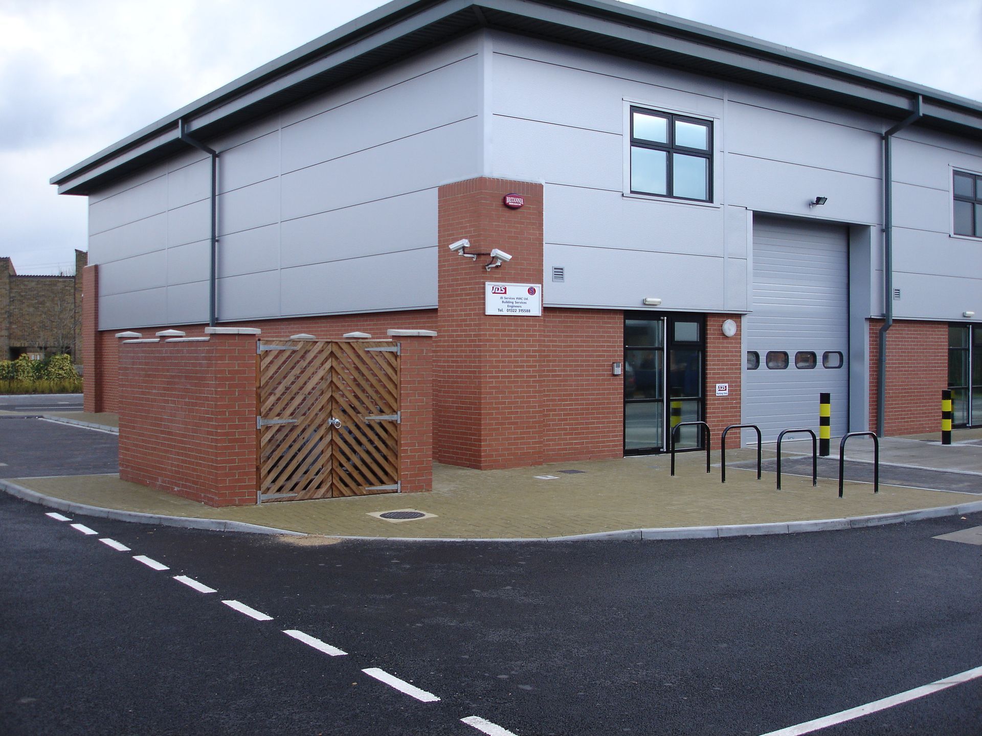 A building with a sign that says ' ambulance ' on it