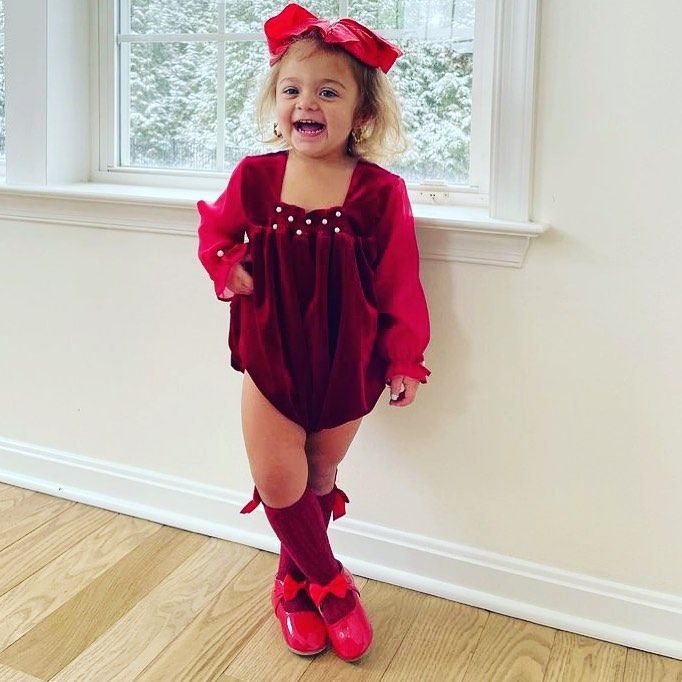 A Little Girl Is Wearing a Red Dress and Red Shoes - Saint Georges, DE - Chavies Boutique
