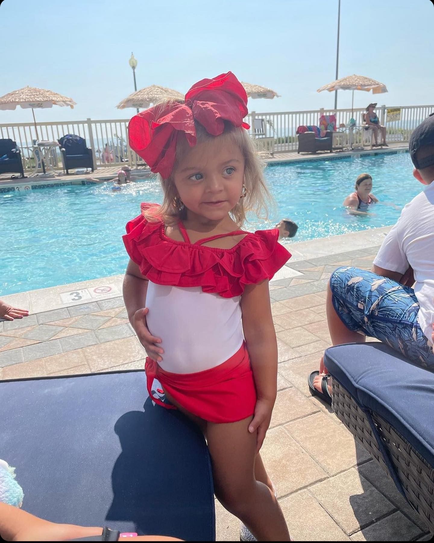 A Girl Wearing a Red Swimsuit - Saint Georges, DE - Chavies Boutique