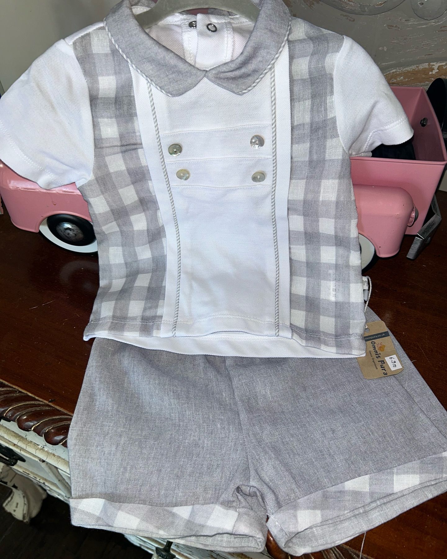 A Baby Boy's Outfit Is Hanging on A Hanger - Saint Georges, DE - Chavies Boutique