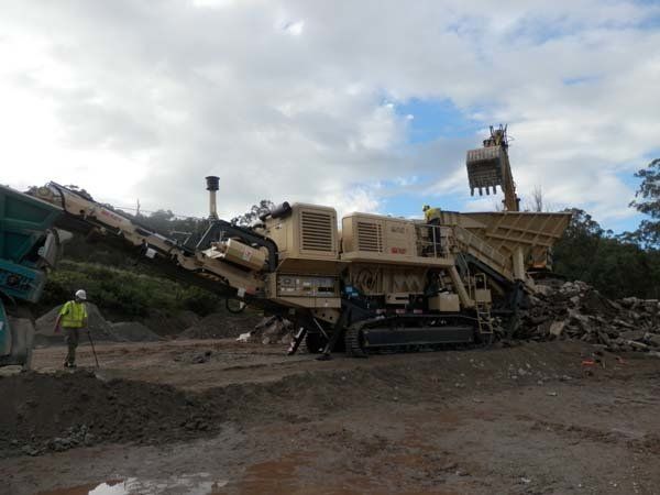 beige crusher at work