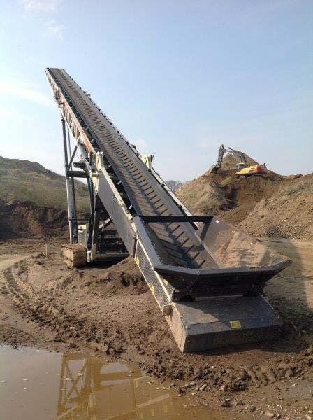 track conveyor belt arm