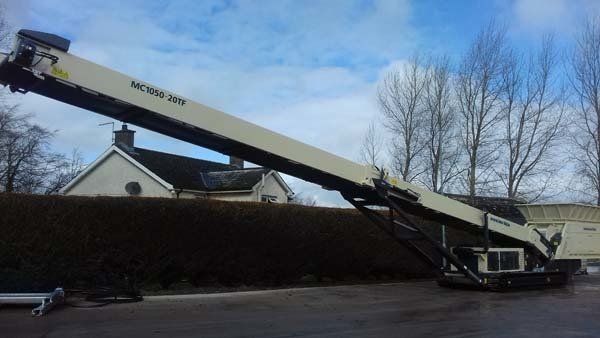 track conveyor arm