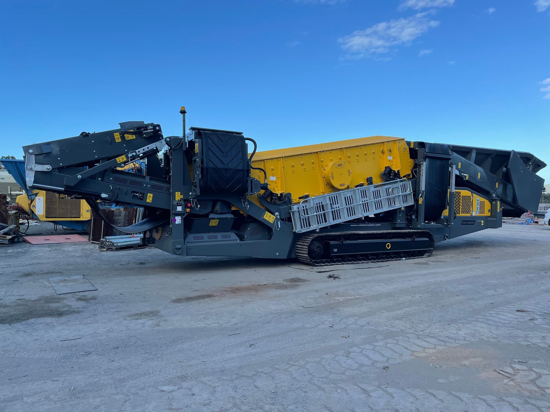 Big Yellow Conveyor With Blue Sky | Yatala | Crusher Screen Sales & Hire