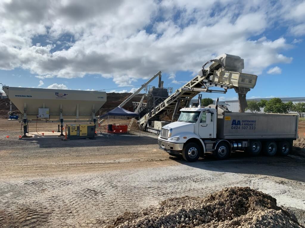 Working using truck pugmill