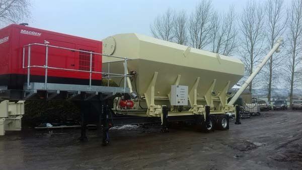 mobile cement silo being towed