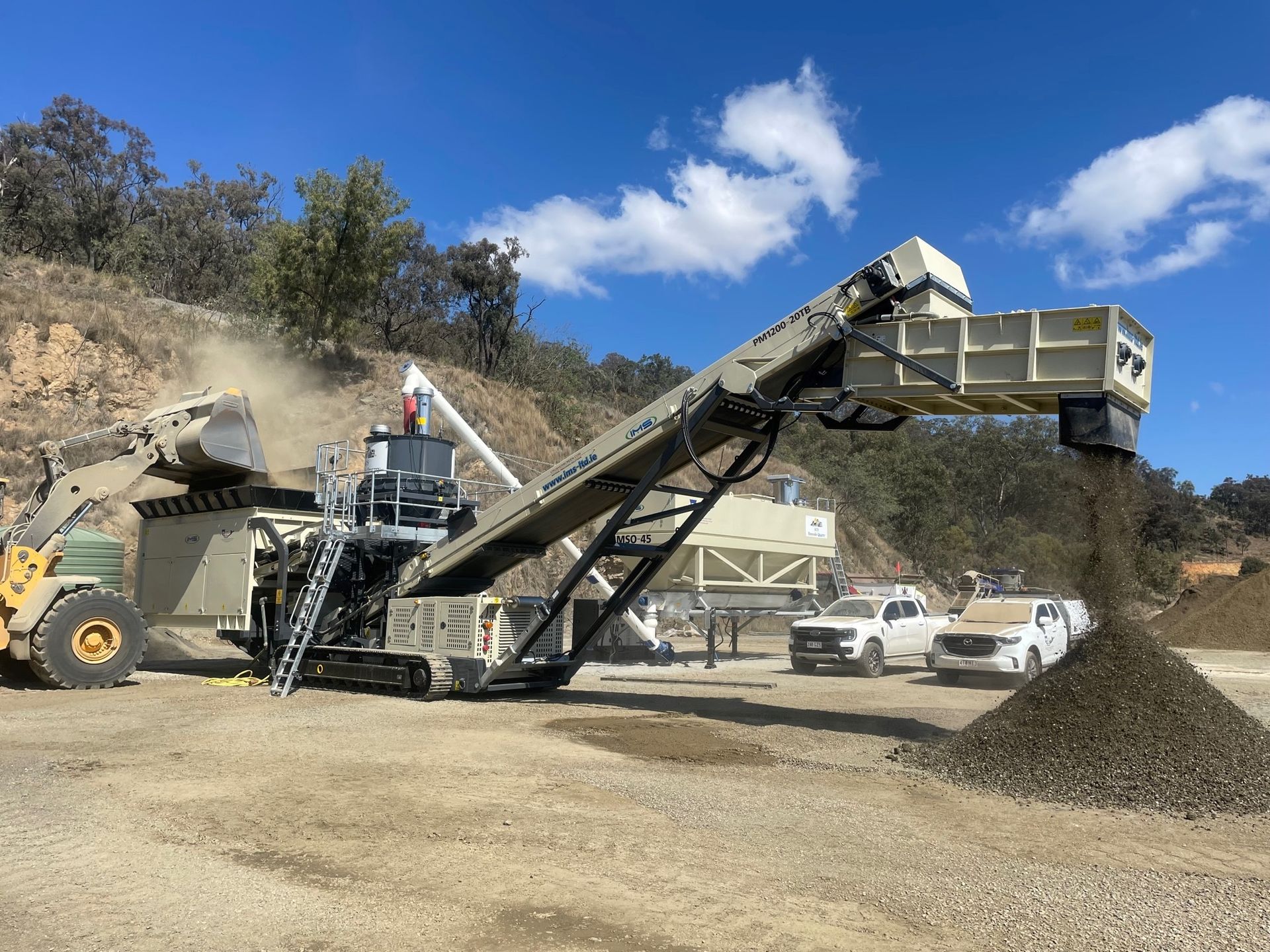A Conveyor Belt Is Being Used To Move Gravel In A Quarry — Yatala Qld — Crusher Screen Sales & Hire