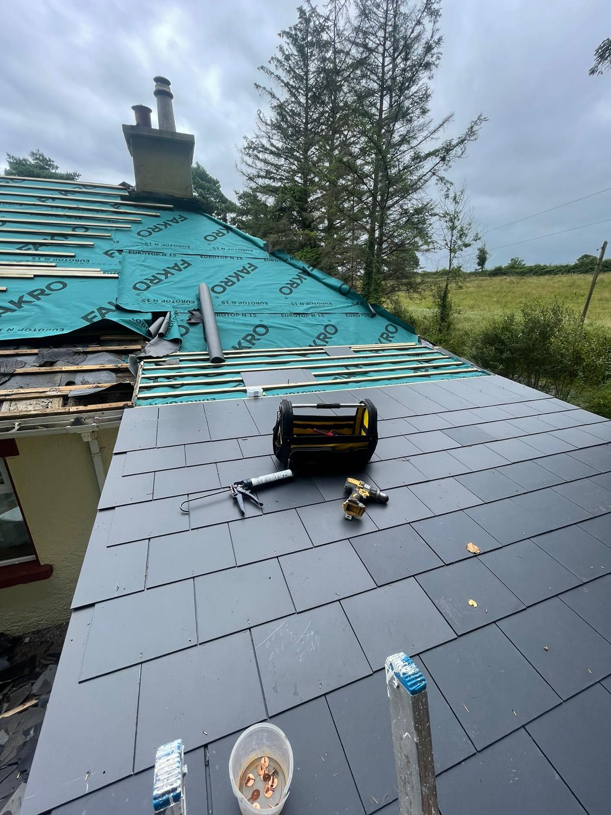 A roof with a toolbox on top of it.