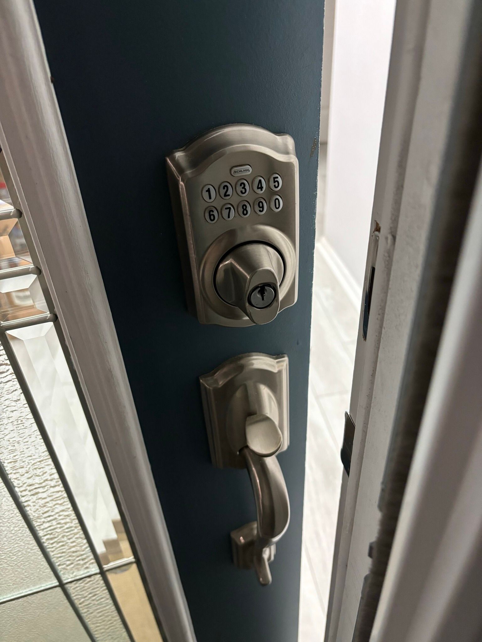 A close up of a door lock on a door.