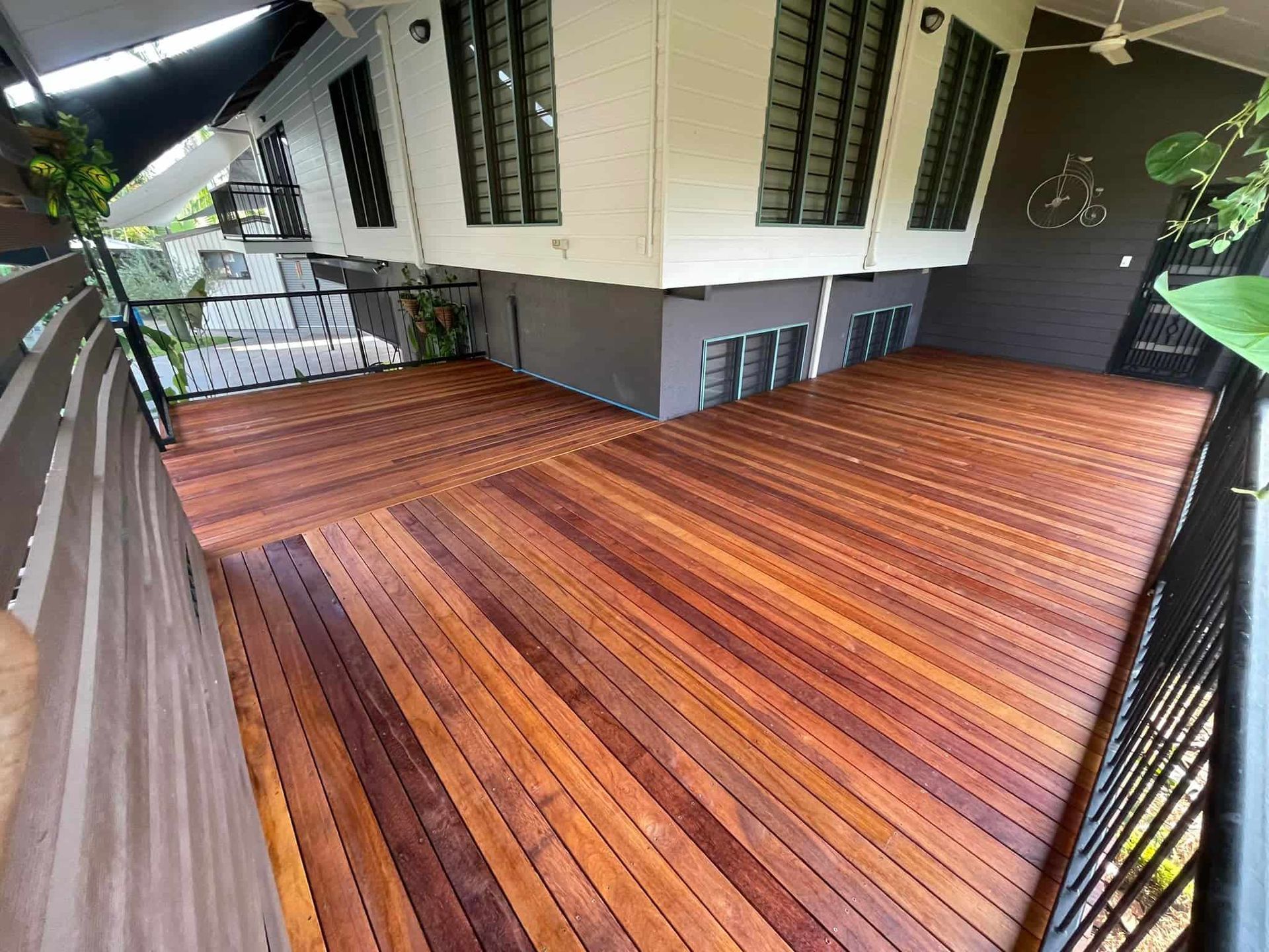 Wooden Deck of a House With Dark Brown and Light Brown Planks — Northco Constructions In Muirhead, NT