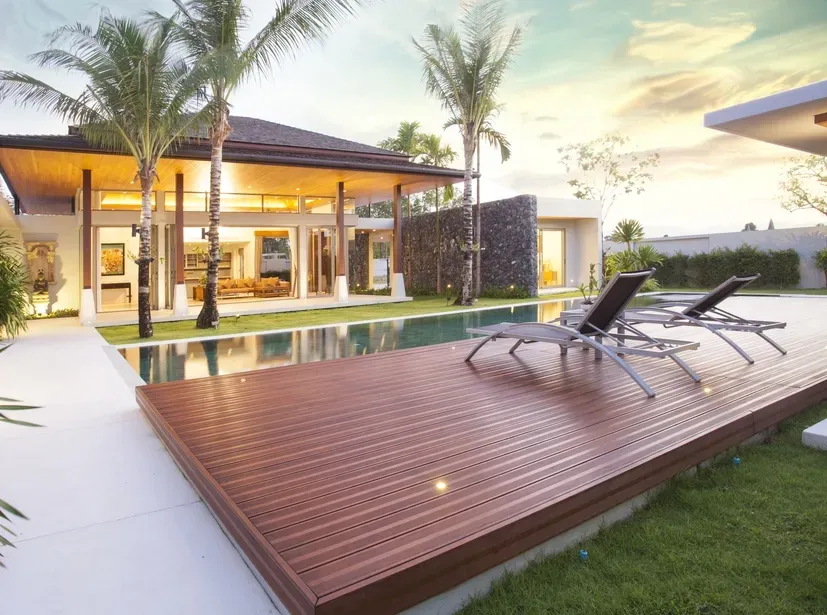 Backyard With Swimming Pool And A Composite Deck With Two Deck Chairs — Northco Constructions In Muirhead, NT