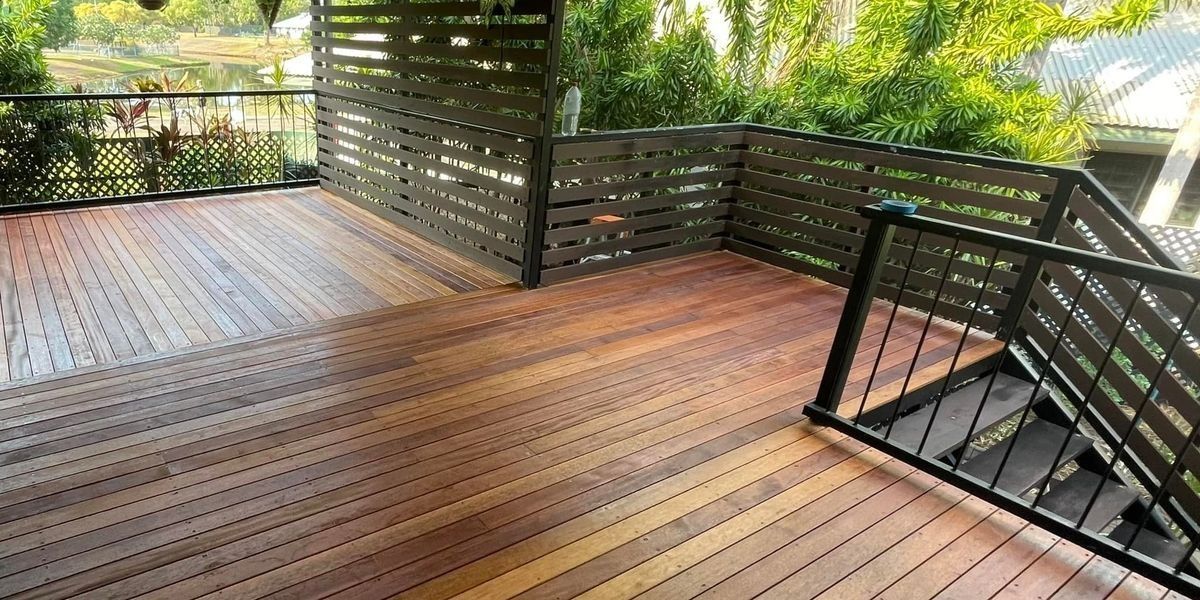 wooden deck with leafy green garden behind — Northco Constructions In Nightcliff, NT
