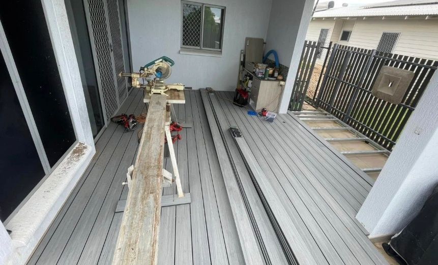 A Deck Under Construction. Gray Composite Decking Boards Are — Northco Constructions In Muirhead, NT