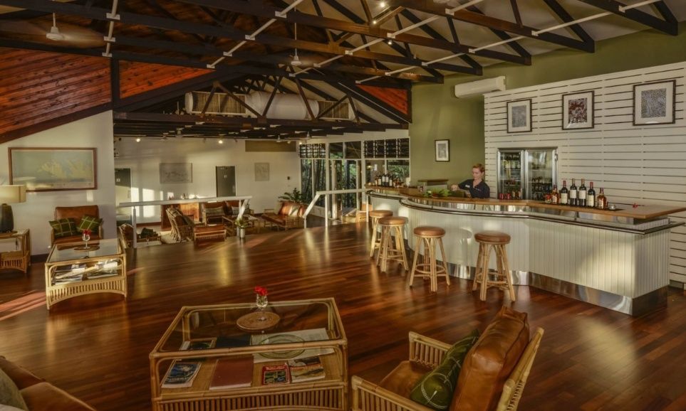 Interior of a Bar With a Wooden Floor and a Bar Area With a Bartender — Northco Constructions In Muirhead, NT
