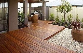 Wooden Deck in a Backyard With a Grill Area, Gravel — Northco Constructions In Muirhead, NT