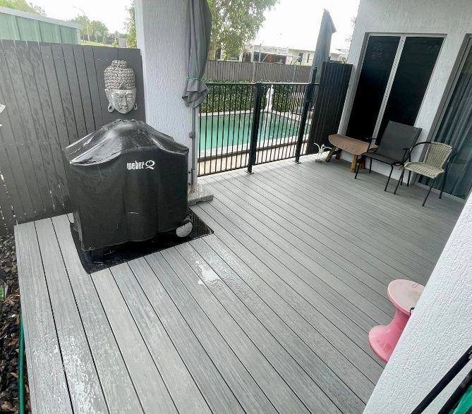 Gray Composite Deck With a Covered Grill — Northco Constructions In Muirhead, NT