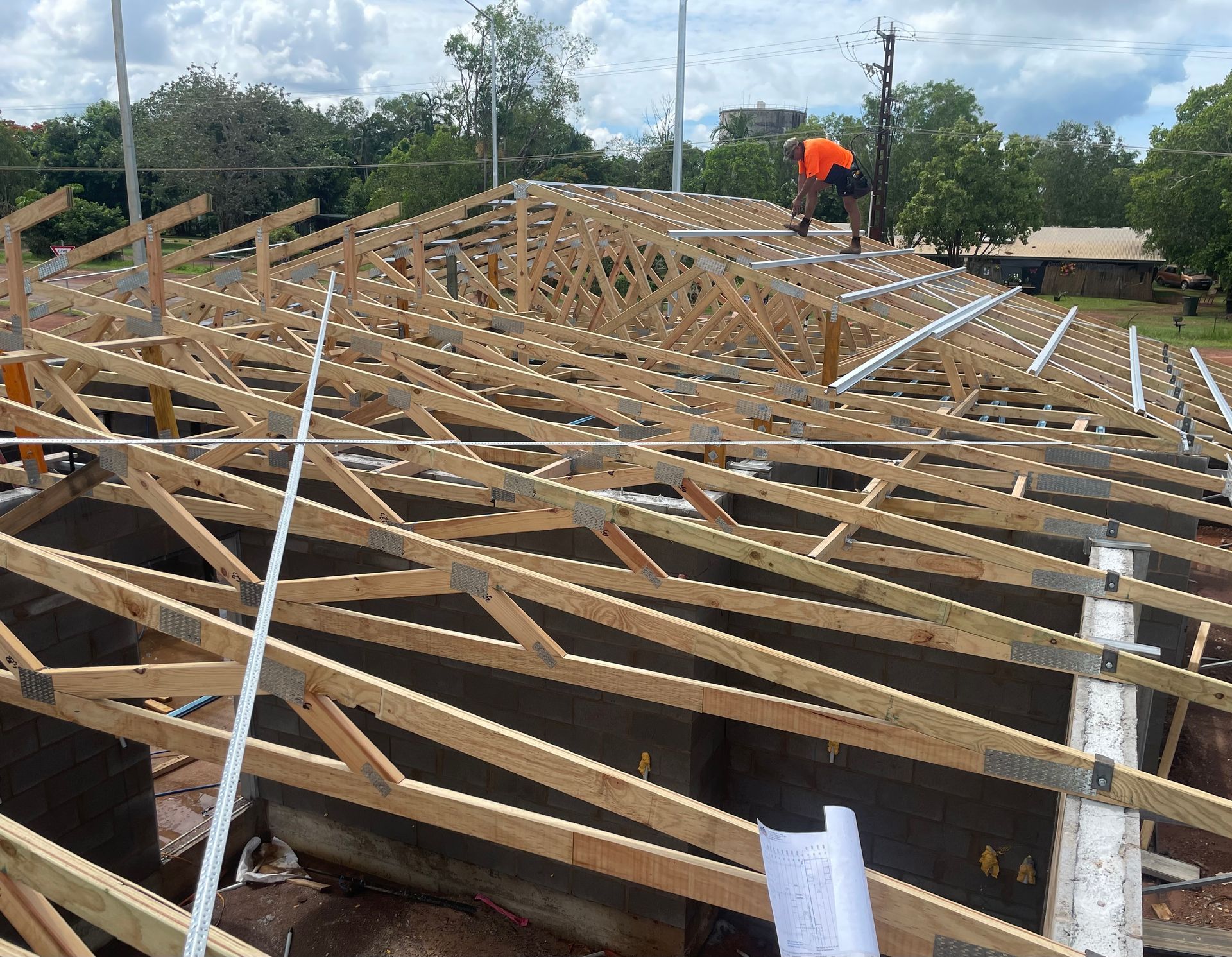 Construction Site With Wooden Roof Trusses — Northco Constructions In Muirhead, NT