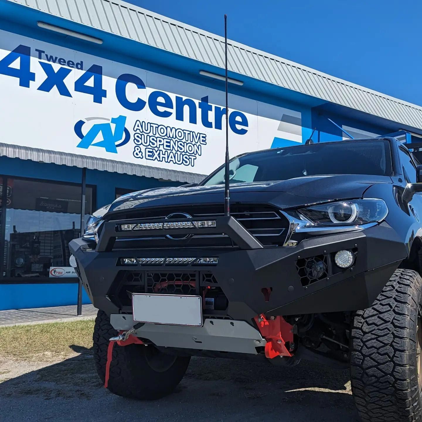 Black Vehicle With Bull Bars And Winch Installed