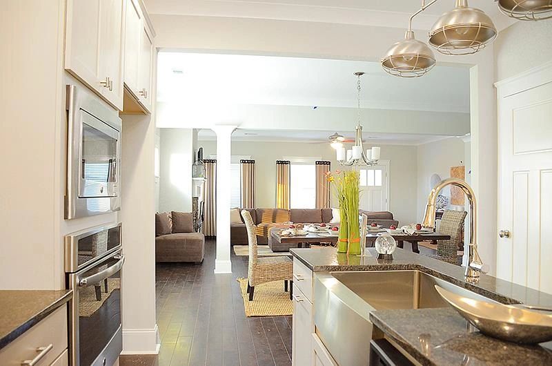 A kitchen with stainless steel appliances and granite counter tops