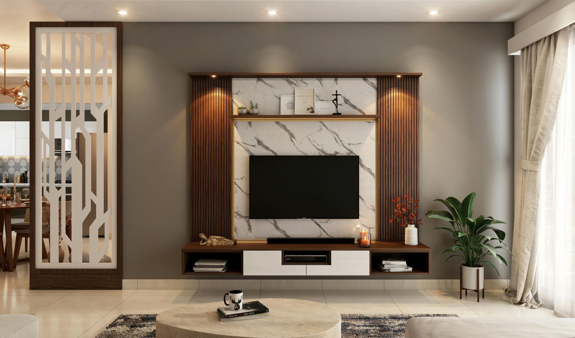 Big screen tv in a family room mounted to the wall between an entertainment center.