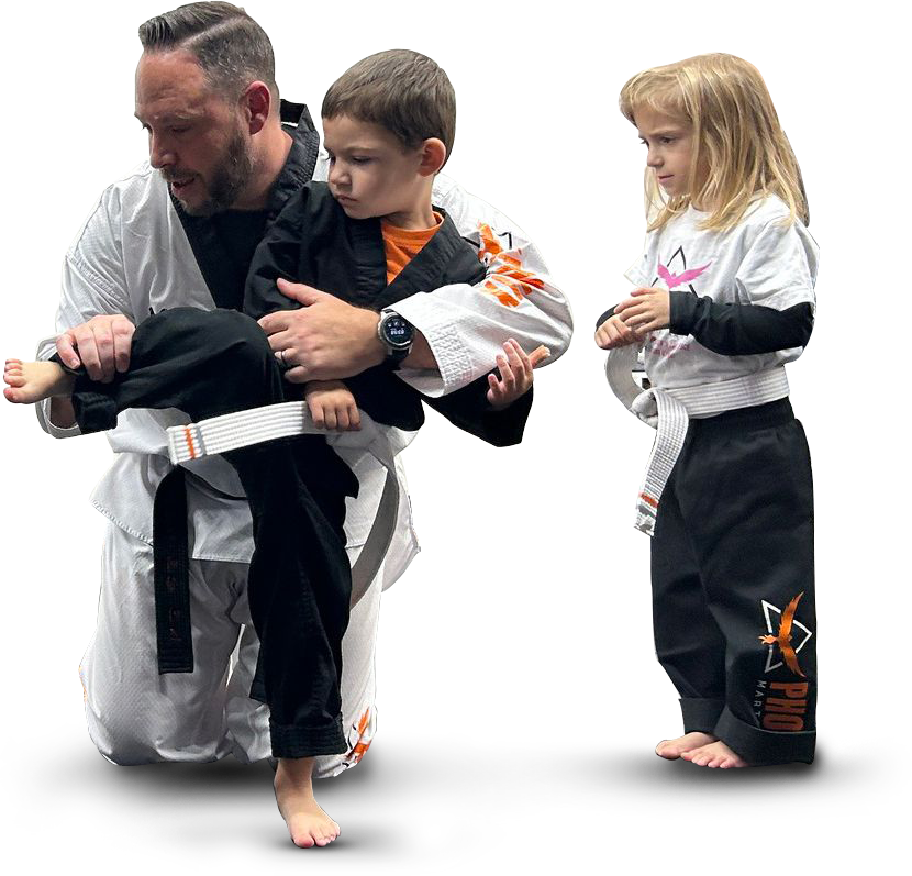 a group of children are practicing martial arts together .