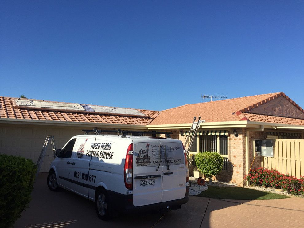 A White Van Is Parked In Front Of A House — Tweed Heads Painting Service In Condong, NSW