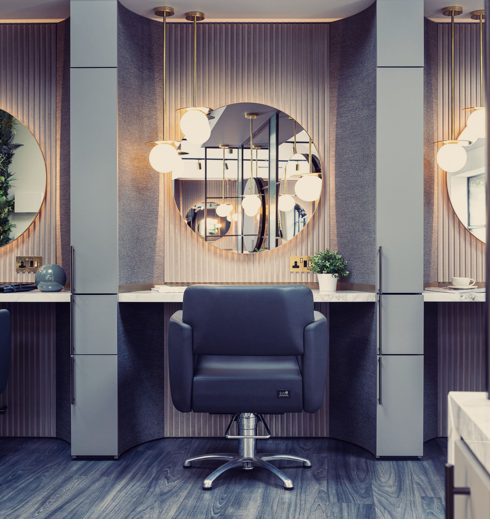 A salon with a long counter and a lot of mirrors