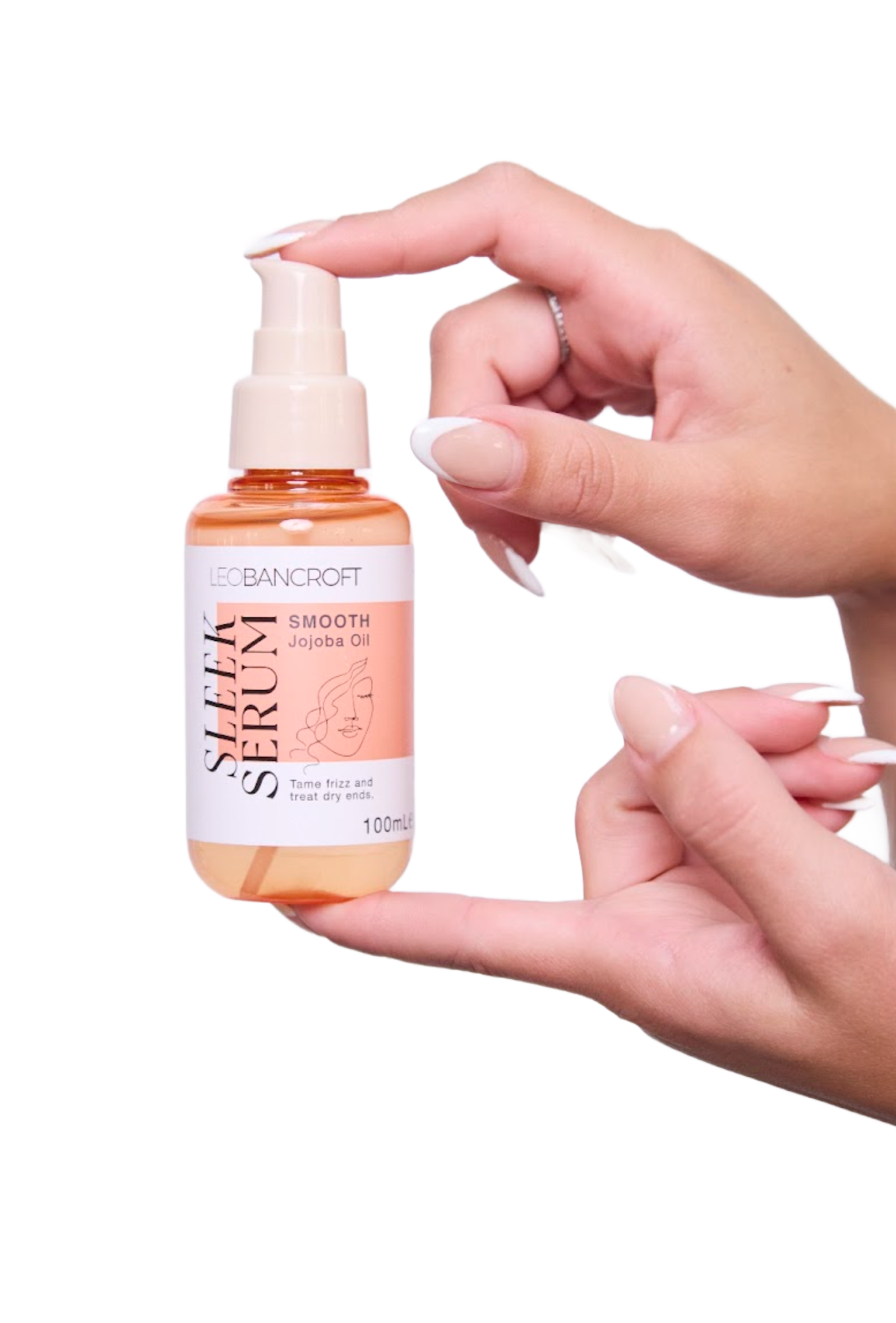 Woman with curly hair holding a turquoise Leo Bancroft hairbrush over her face, smiling against a light background