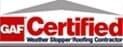 A gas certified logo with a house in the background