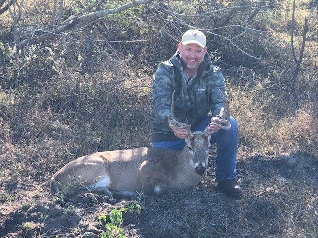 Guy Posing with Trophy Deer
