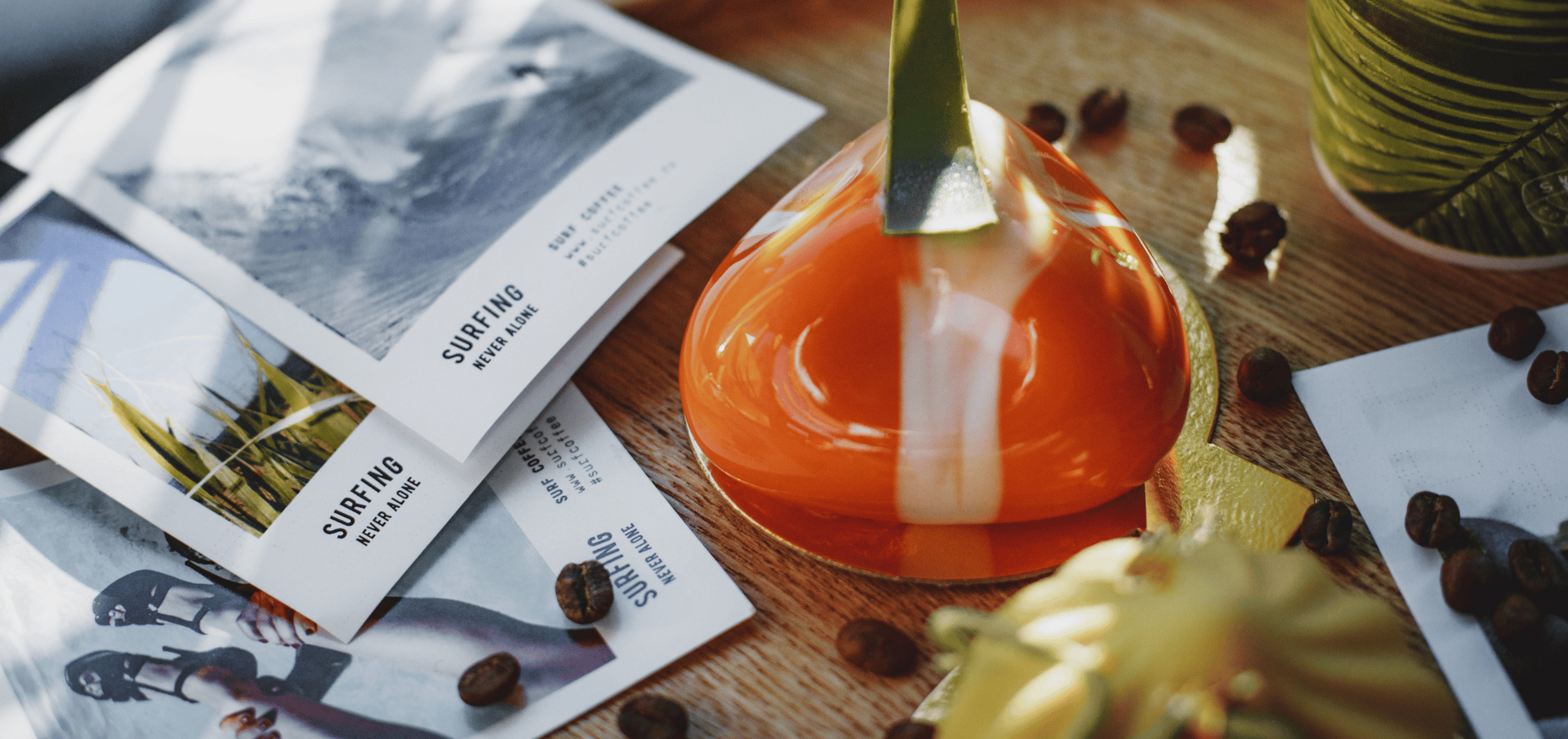 A stack of business cards sitting on top of a wooden table.