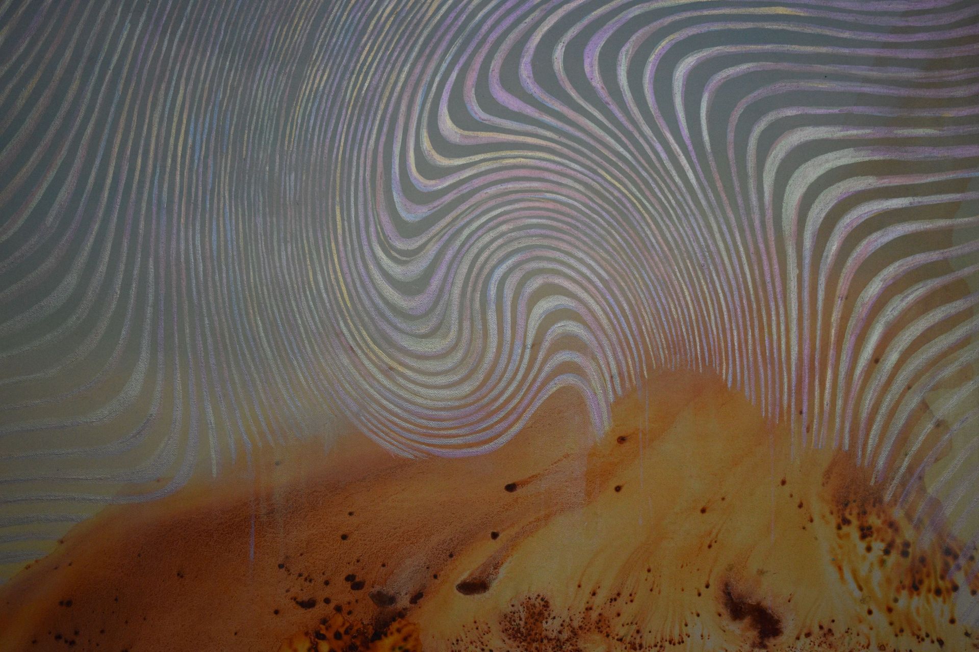 A close up of a painting with a swirl pattern on it.
