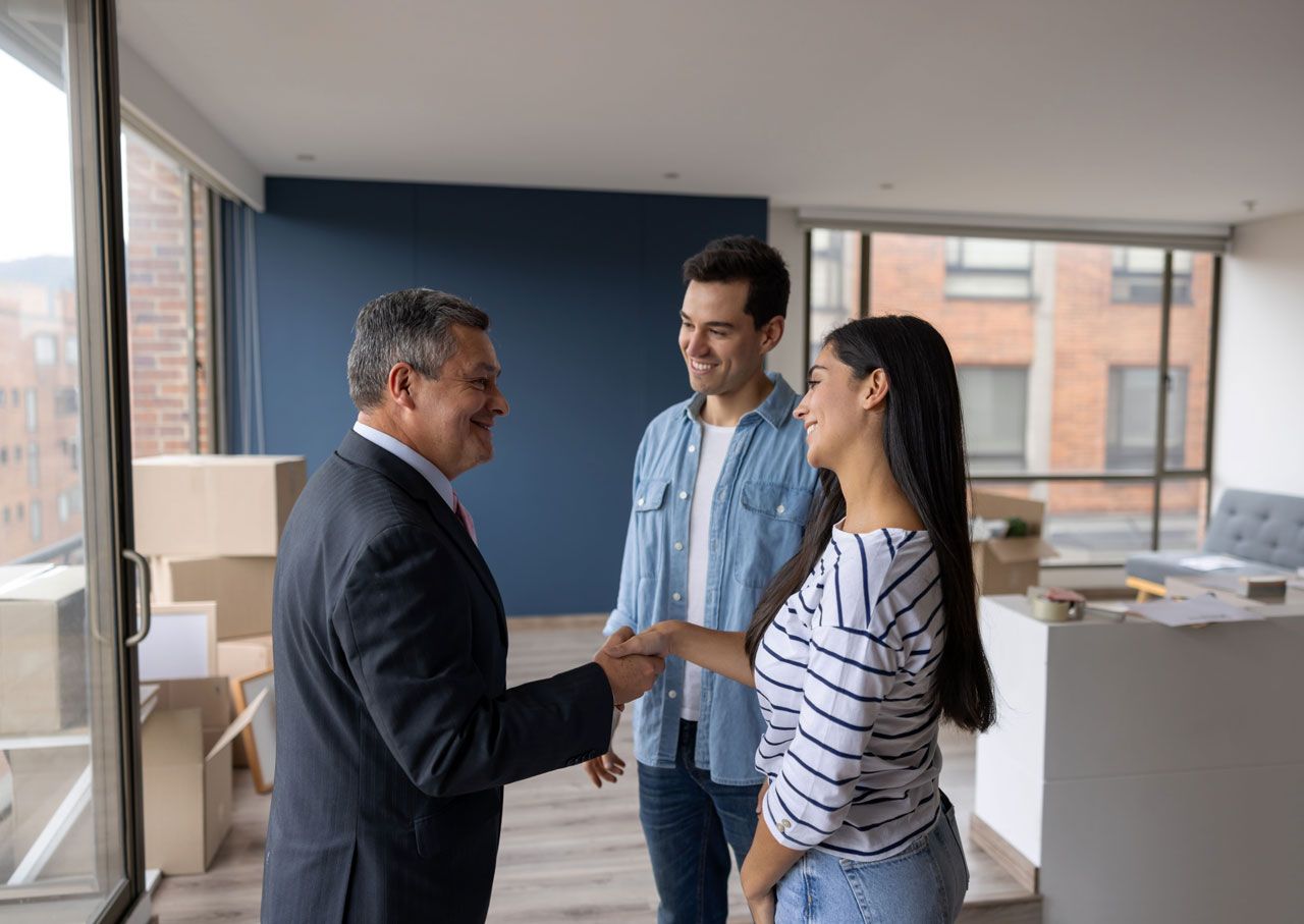 Couple Checking Out Houses — Agawam, MA — Yusenko Law