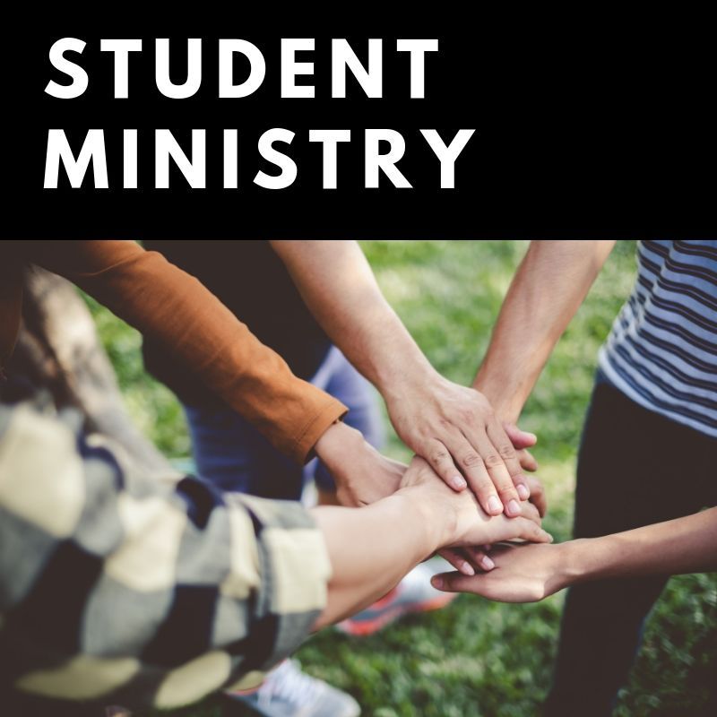 A group of people putting their hands together under the words student ministry