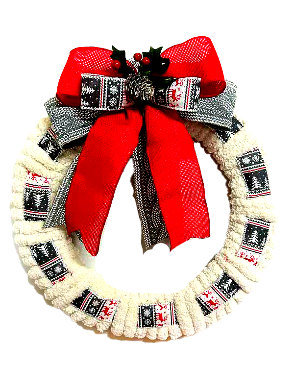 A christmas wreath with a red bow on it