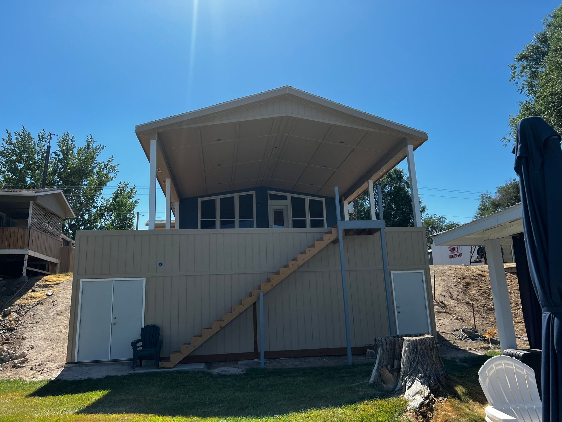 A house with stairs leading up to the second floor