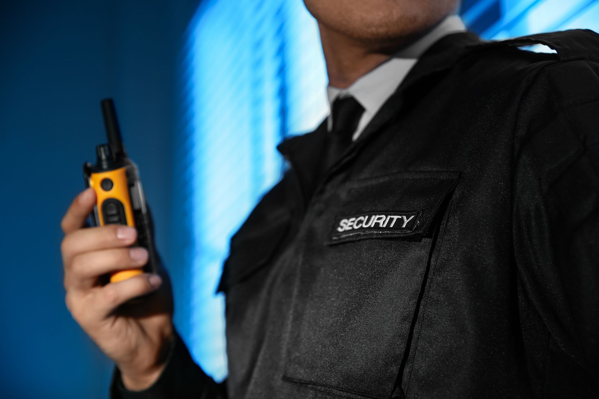 Reliable private security guard service monitoring a facility with high-tech communication tools. Reliable private security guard service monitoring a facility with high-tech communication tools.