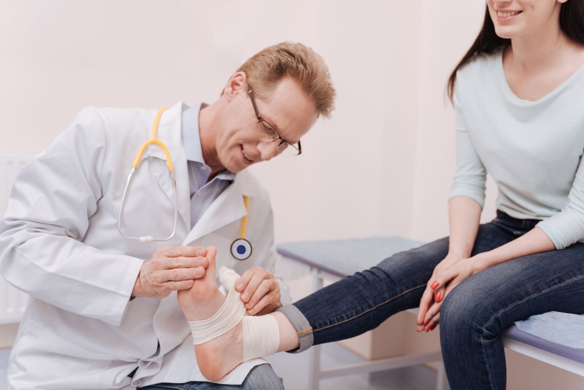 Advanced Foot Doctor Podiatrist Treating a Patient's Bandaged Foot in Rochester, NY.