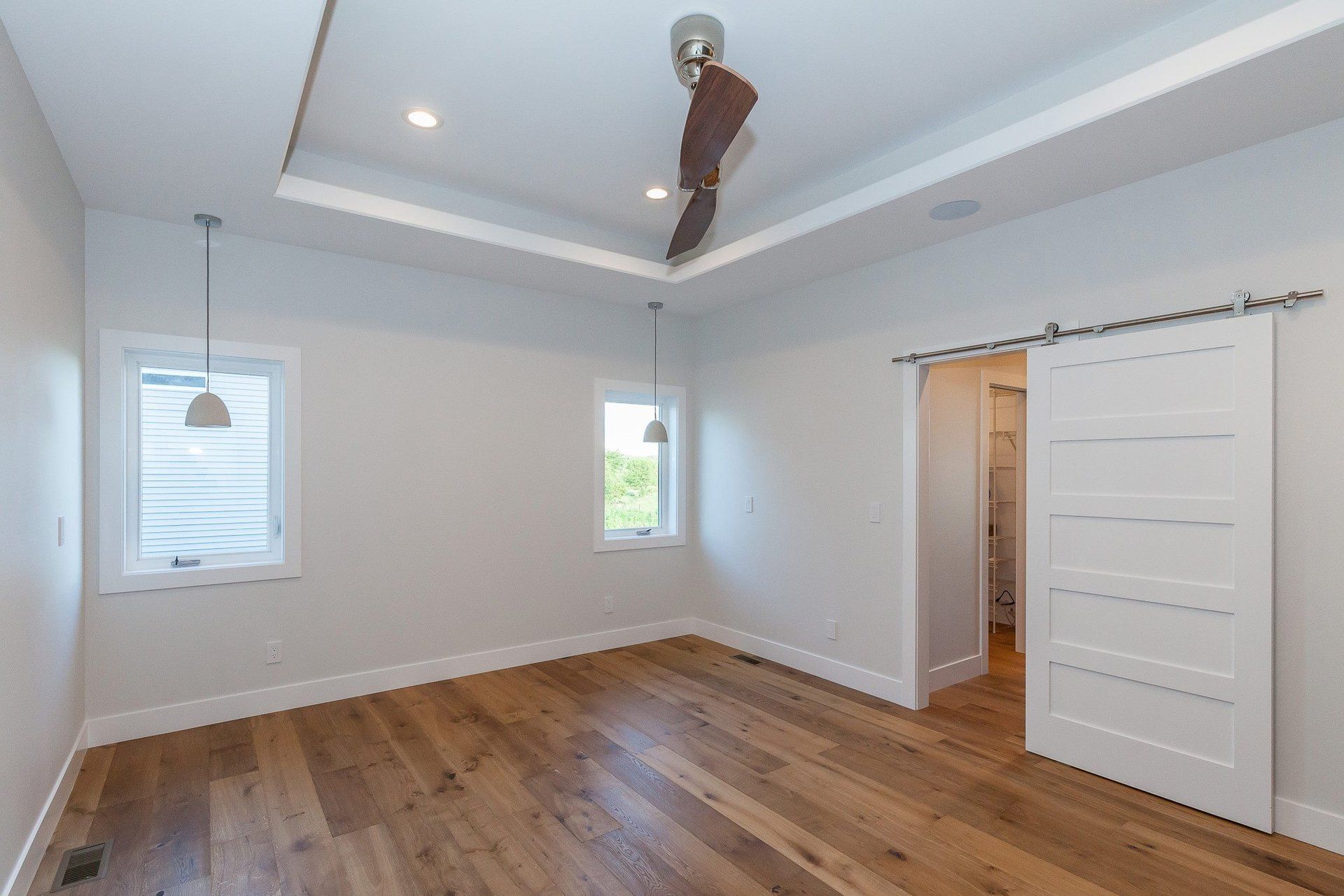 empty room and brown ceiling fan
