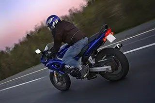 Person riding motorcycle