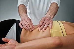 Osteopath Working With Patient — Edwardsburg, MI — Dig Deep Massage Co.
