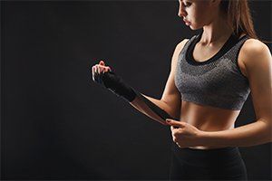 Athletic Boxer Wrapping Hands — Edwardsburg, MI — Dig Deep Massage Co.