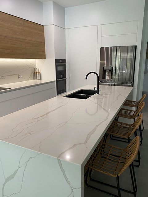 Chairs and tables in the kitchen — Cabinetry in Cairns, QLD