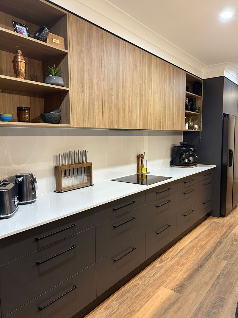 Dark brown drawers and light brown cabinet — Cabinetry in Cairns, QLD