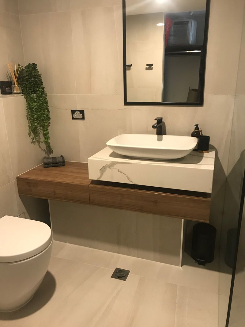 Bathroom sink and mirror — Cabinetry in Cairns, QLD