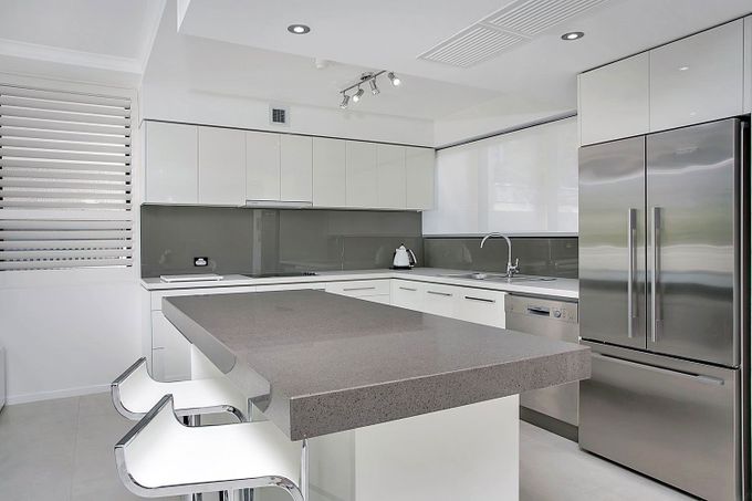 Grey themed kitchen — Cabinetry in Cairns, QLD
