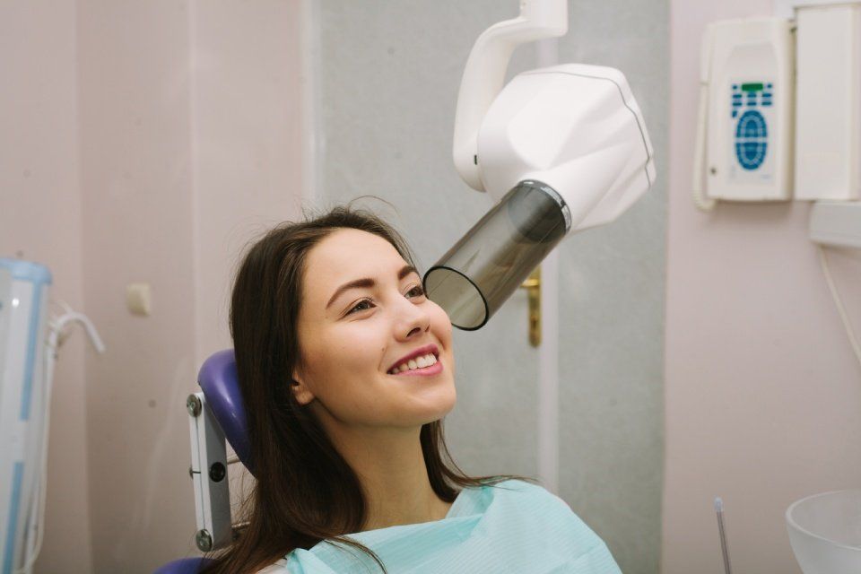 Paziente durante esame dentale