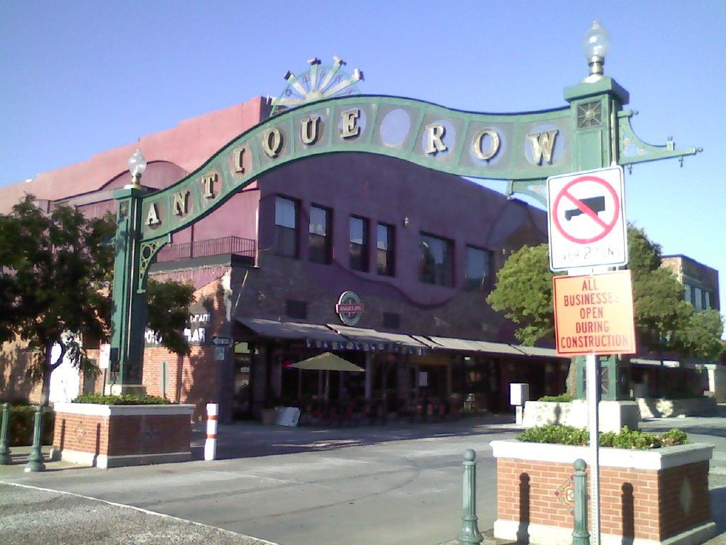 Antique row has a green archway over the entrance
