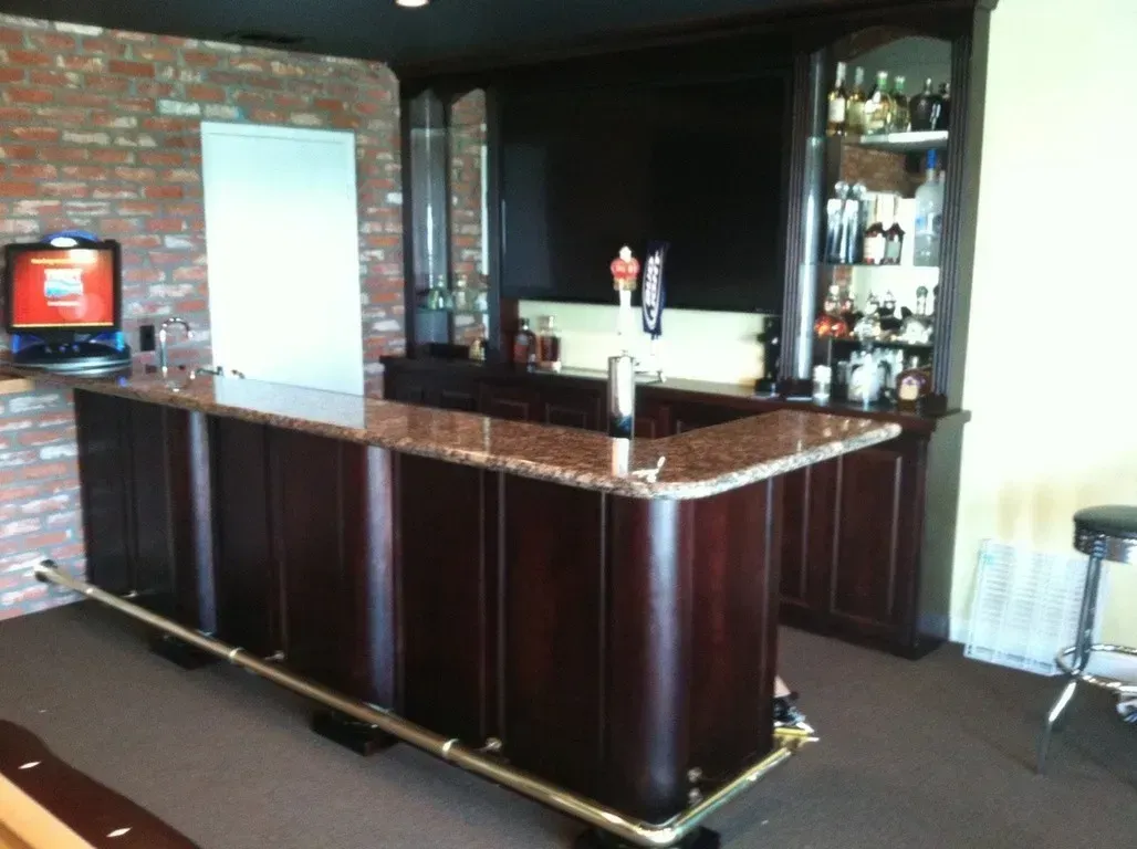 A bar in a room with a brick wall